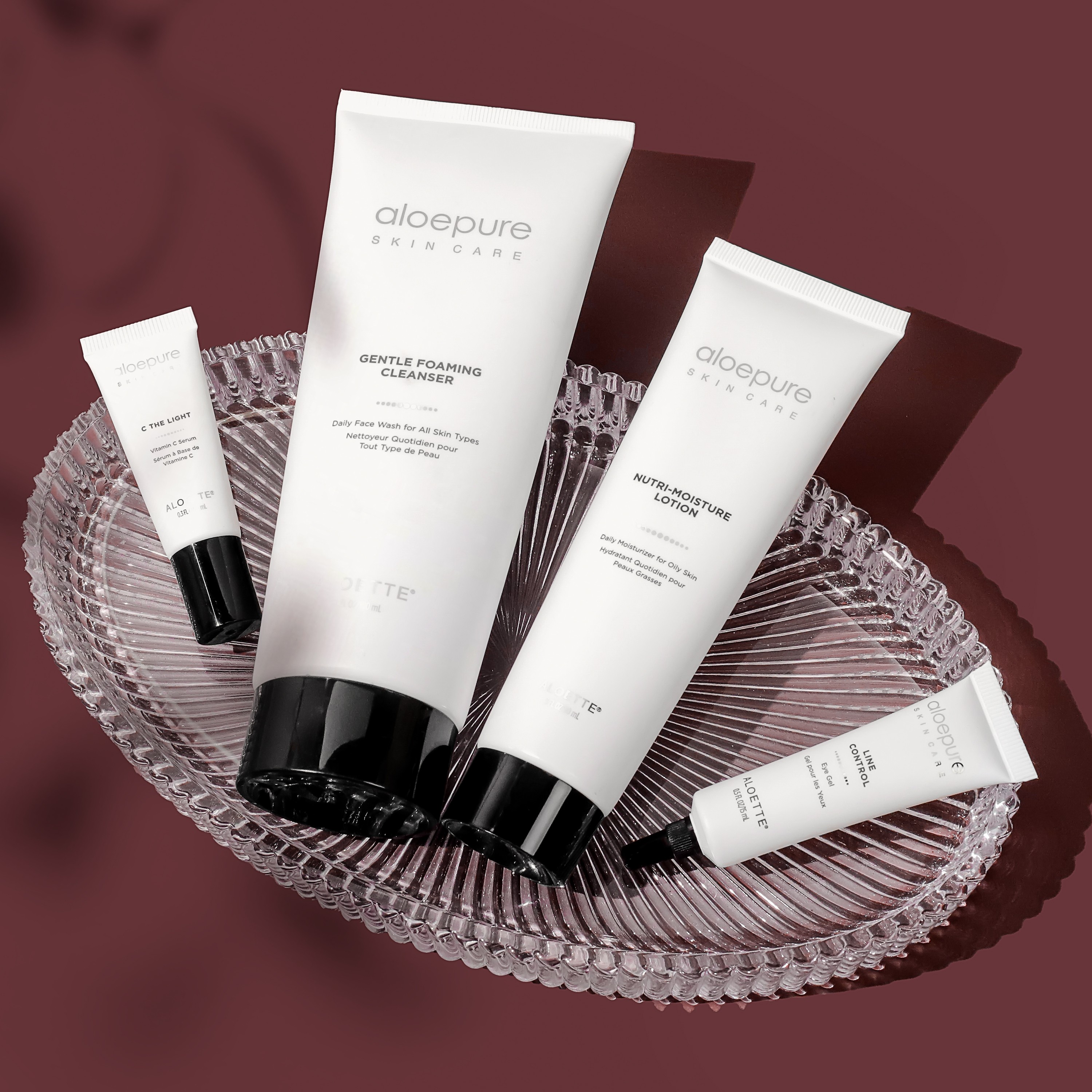 C The Light Line Control Gentle Cleanser Nutri Moisture on tray and red shadows 3000@300dpi