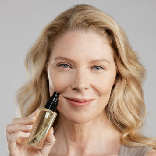 Essential Cleansing Oil_Carrie_Holding Product-1164.jpg