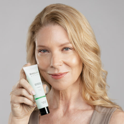 Restorative Enzyme Peel_Carrie1_Holding Product.jpg